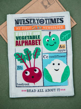 Load image into Gallery viewer, Fruit & Veg Alphabet Crinkly Cloth Newspaper